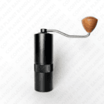 Manual coffee hand grinder with ergonomic handle design