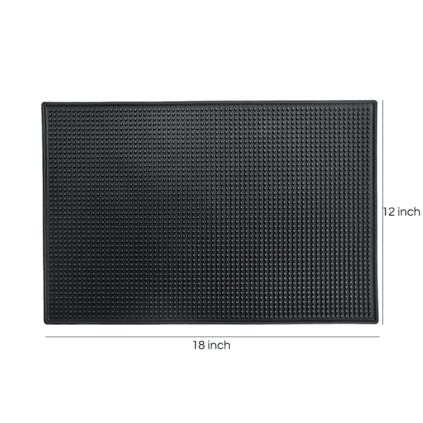 Bar mat holding glasses on bar counter