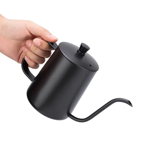 Barista using 600ml gooseneck pour over kettle to brew V60 coffee in Bangladesh